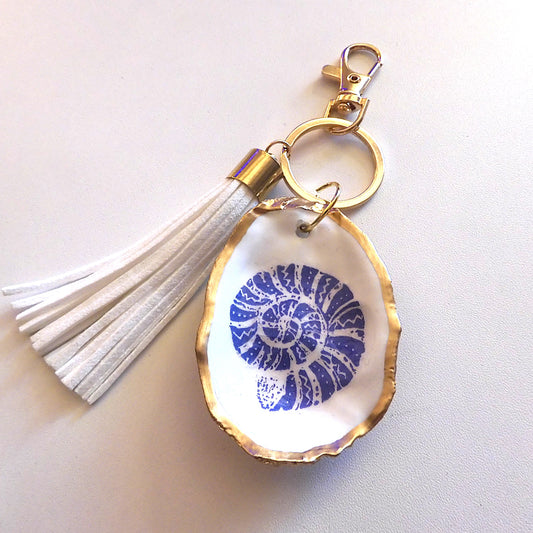 GOLD TASSEL KEYRING WITH OYSTER SHELL CHARM - Blue Nautilus Shell