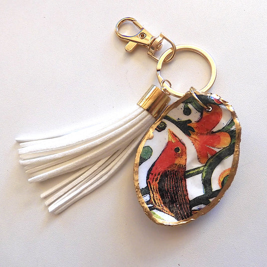 GOLD TASSEL KEYRING WITH OYSTER SHELL CHARM - BIRD