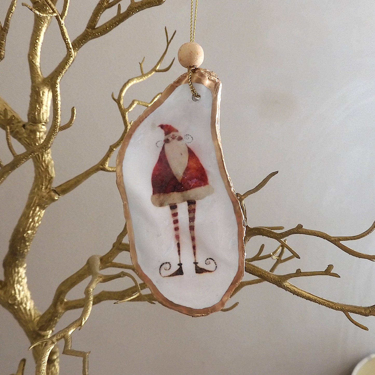 HANGING OYSTER SHELL CHRISTMAS ORNAMENT ' Santa with striped legs'