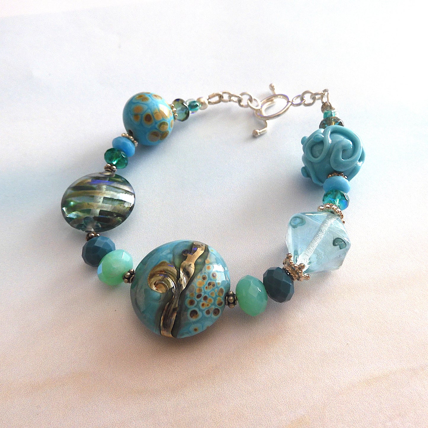 Blue Lagoon – Beach Inspired Handcrafted Lampwork Glass Beads and Sterling Silver