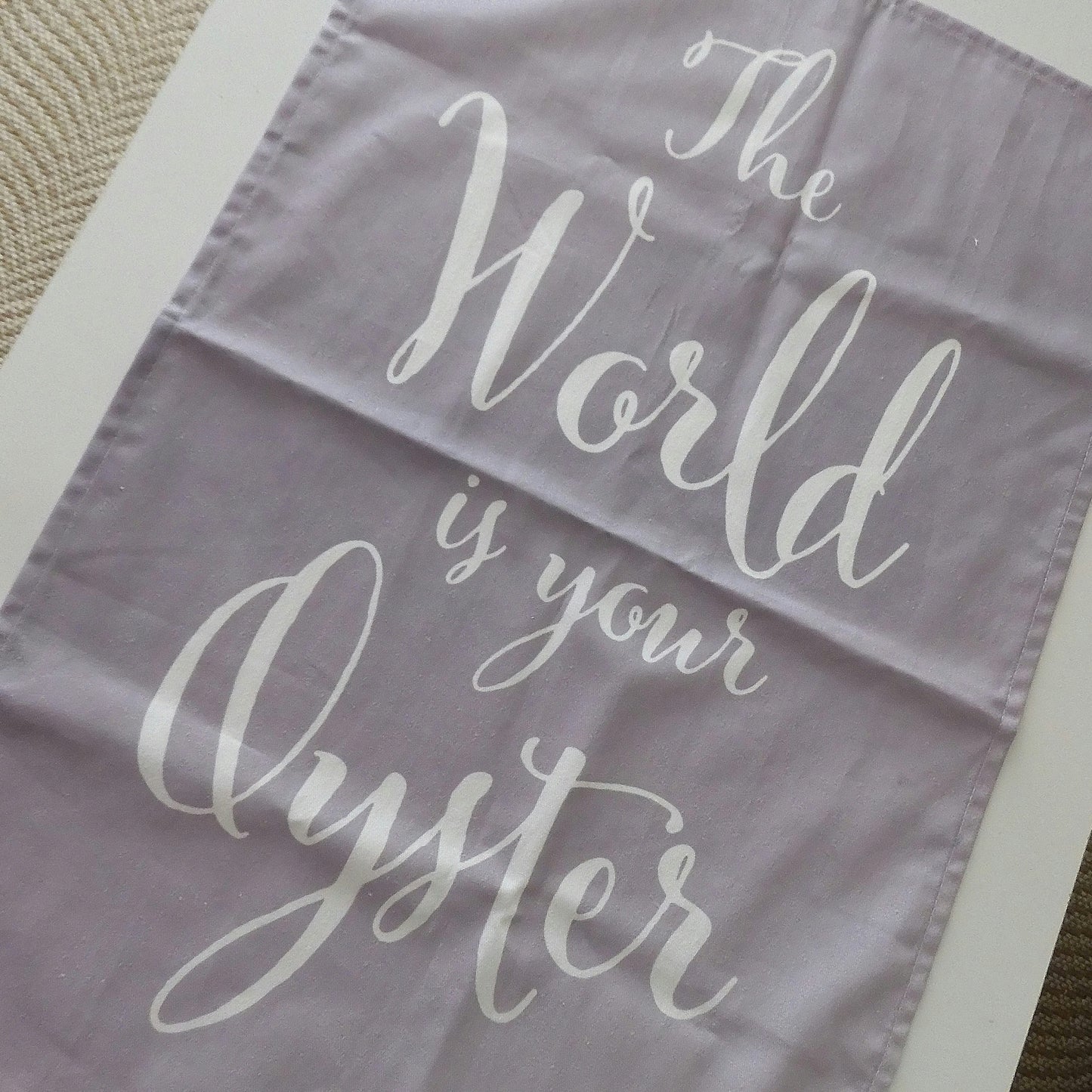 'THE WORLD IS YOUR OYSTER' TEA TOWEL - Grey & White