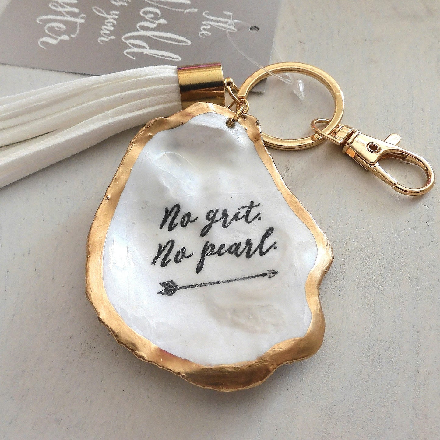 GOLD TASSEL KEYRING 'NO GRIT NO PEARL' OYSTER SHELL