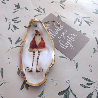 HANGING OYSTER SHELL CHRISTMAS ORNAMENT ' Santa with striped legs'